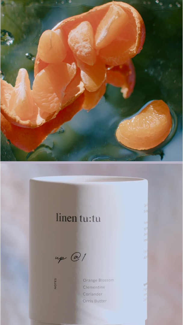 scenes of orange blossom petals, clementine, water and white linens 